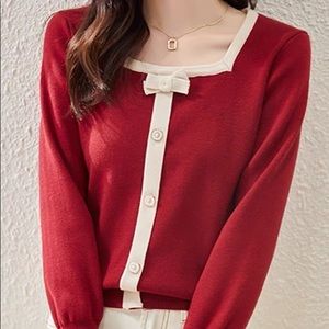 Red with white trim sweater